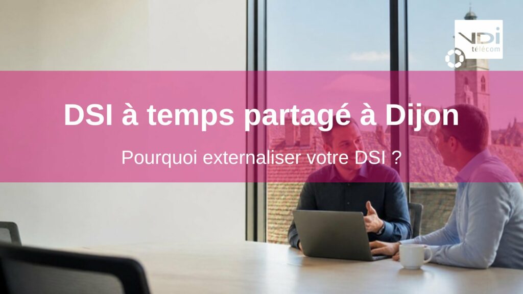 DSI à temps partagé à Dijon : consultant informatique en rendez-vous avec un dirigeant dans un bureau donnant sur les toits de Dijon