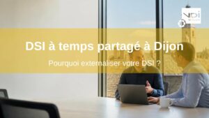 DSI à temps partagé à Dijon : consultant informatique en rendez-vous avec un dirigeant dans un bureau donnant sur les toits de Dijon