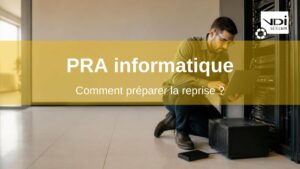 PRA informatique : ingénieur vérifiant la restauration des sauvegardes d'un serveur sur son ordinateur portable